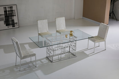 Table de salle à manger moderne et luxueuse argentée avec plateau en verre trempé