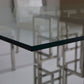 Table de salle à manger moderne et luxueuse argentée avec plateau en verre trempé