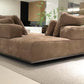 SRF LIVING CELOR contemporary two-tone modular sectional sofa with cognac brown and ivory upholstery, wide chaise seating and plush back cushions.