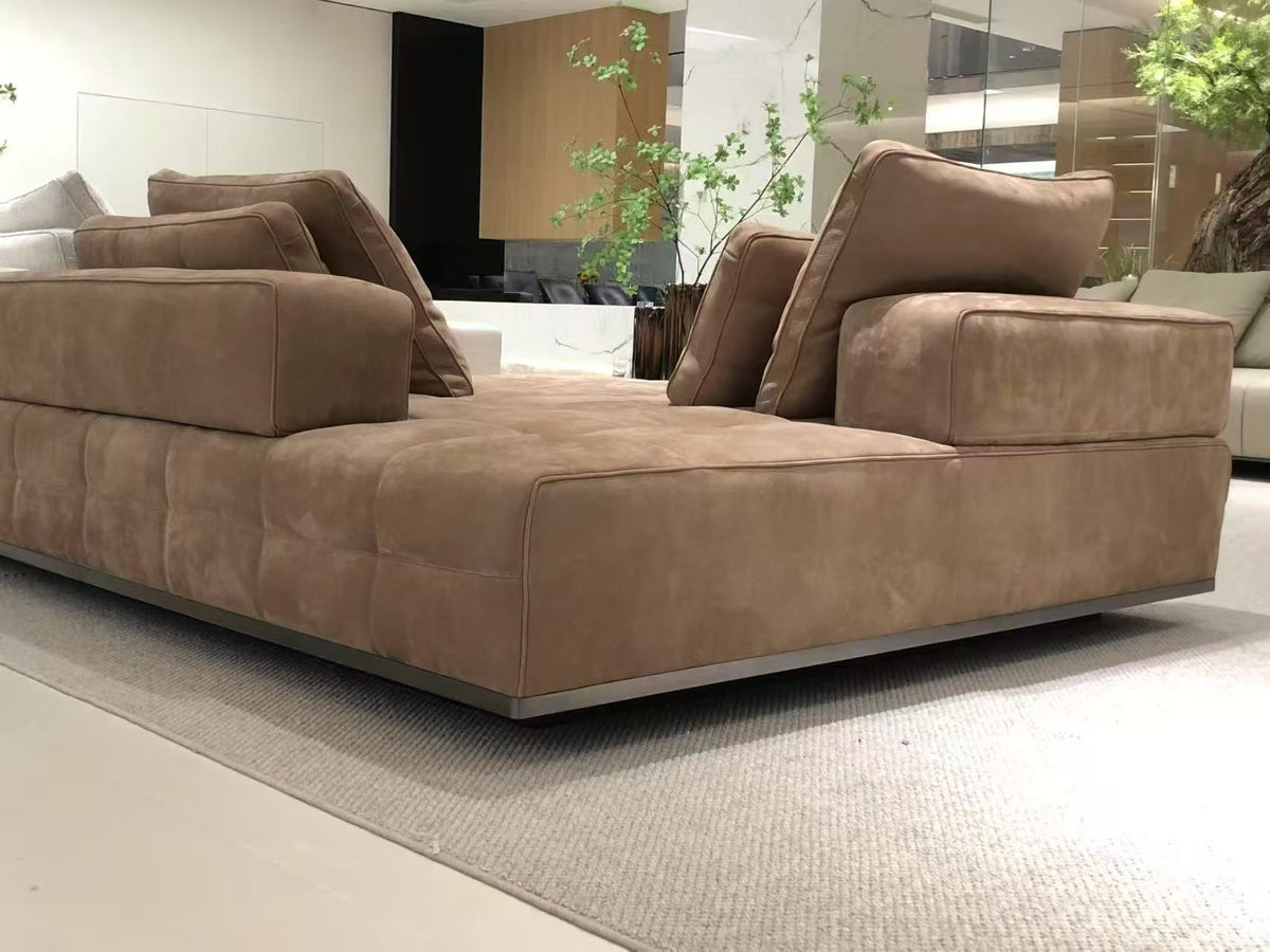 SRF LIVING CELOR contemporary two-tone modular sectional sofa with cognac brown and ivory upholstery, wide chaise seating and plush back cushions.