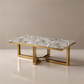 Coffee table with marble top and gold frame on a beige background