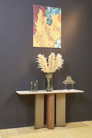 ELISE console table with white stone top, walnut veneer column and brushed bronze legs – styled close front view