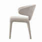 KELVA Sculptural Upholstered Dining Chair with Curved Wingback