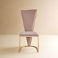 Honeycomb high-back dining chair with mauve velvet upholstery and polished gold metal frame – front view