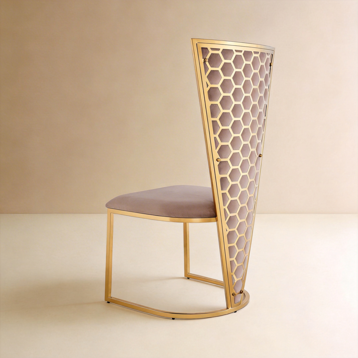 Rear three-quarter view of Honeycomb high-back chair with gold hexagonal lattice and mauve velvet panel