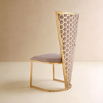 Rear three-quarter view of Honeycomb high-back chair with gold hexagonal lattice and mauve velvet panel
