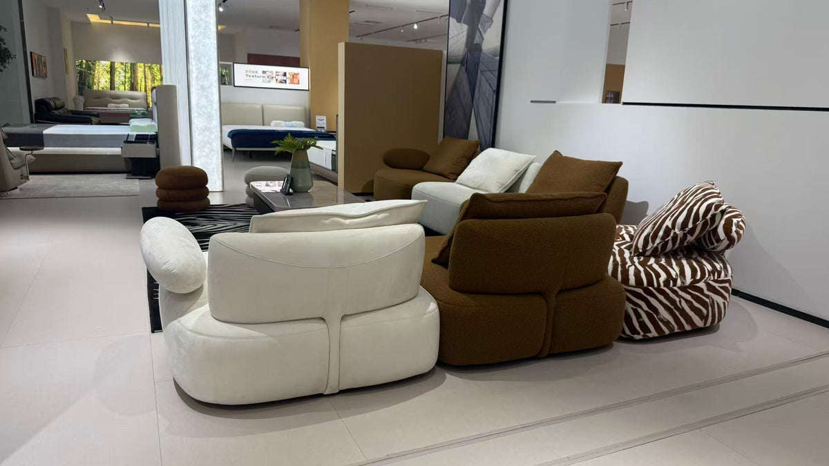 MIRA contemporary modular lounge sofa in brown, ivory and zebra-pattern upholstery.