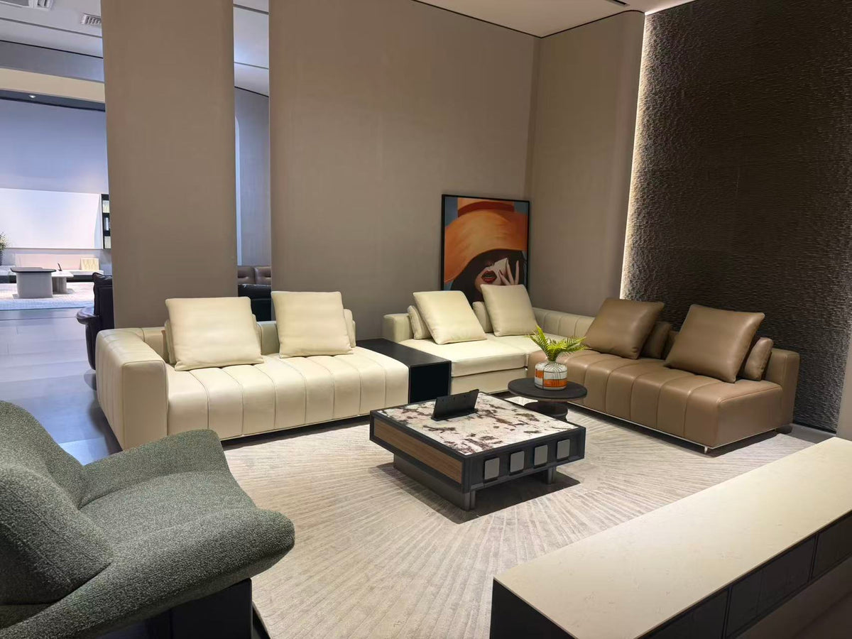 LIVIO modern modular sofa in ivory and tan with wide seats and vertical stitched detailing.