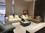 LIVIO modern modular sofa in ivory and tan with wide seats and vertical stitched detailing.