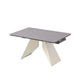 Modern beige extension dining table in compact position with light Vic grey sintered stone top