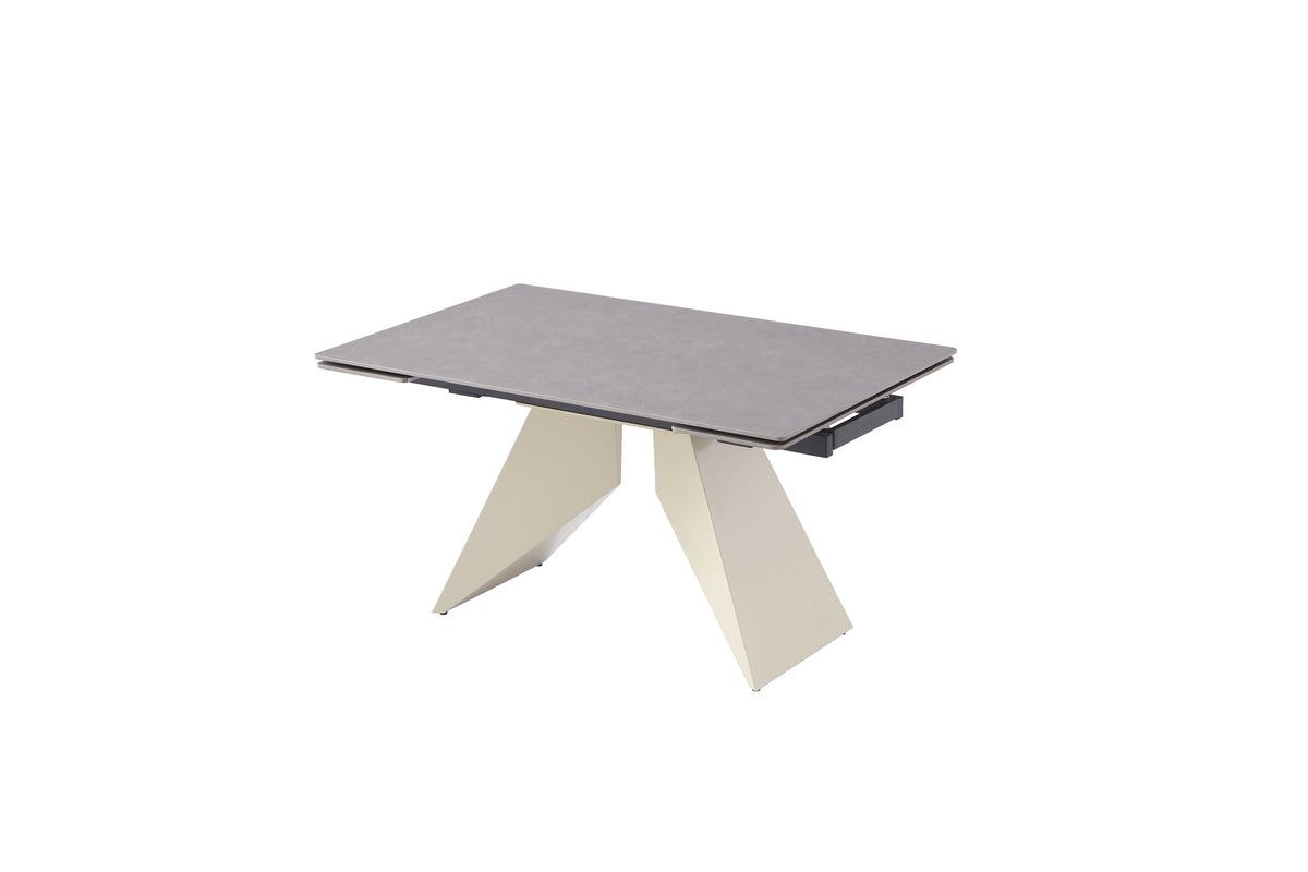 Modern beige extension dining table in compact position with light Vic grey sintered stone top