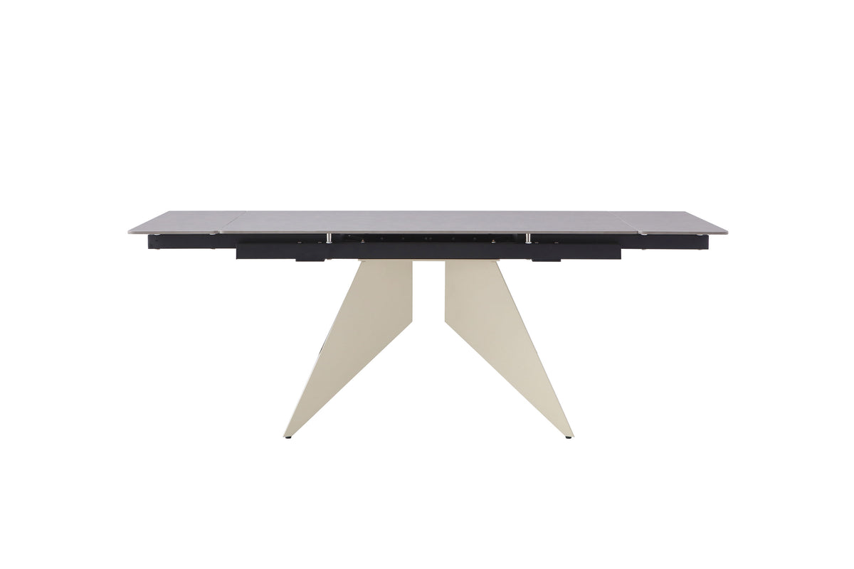 Modern beige extension dining table with light Vic grey sintered stone top and angular pedestal legs – front view