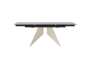 Modern beige extension dining table with light Vic grey sintered stone top and angular pedestal legs – front view