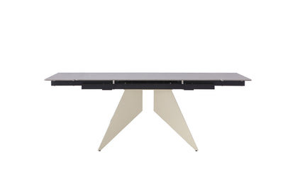 Modern beige extension dining table with light Vic grey sintered stone top and angular pedestal legs – front view