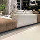 SRF LIVING CELOR contemporary two-tone modular sectional sofa with cognac brown and ivory upholstery, wide chaise seating and plush back cushions.