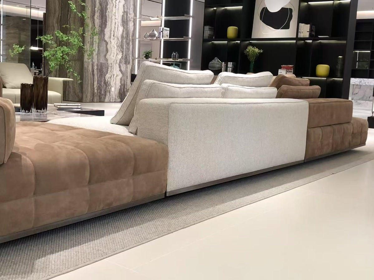SRF LIVING CELOR contemporary two-tone modular sectional sofa with cognac brown and ivory upholstery, wide chaise seating and plush back cushions.