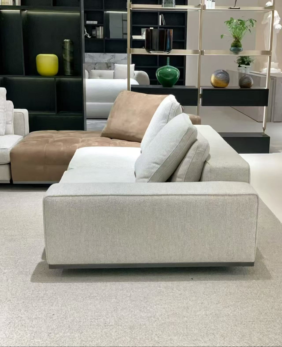 SRF LIVING CELOR contemporary two-tone modular sectional sofa with cognac brown and ivory upholstery, wide chaise seating and plush back cushions.