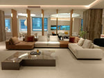 SRF LIVING CELOR contemporary two-tone modular sectional sofa with cognac brown and ivory upholstery, wide chaise seating and plush back cushions.